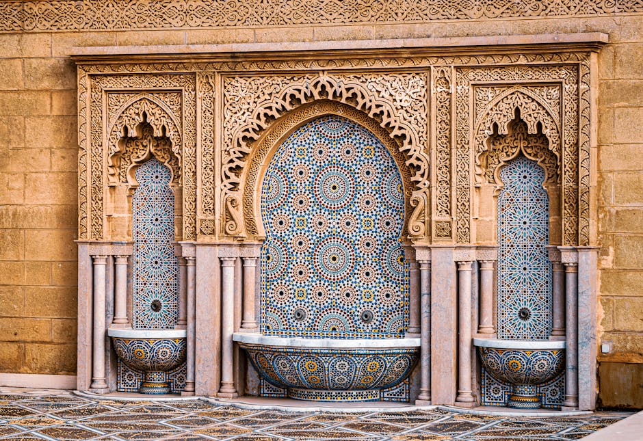 Beautiful Moroccan mosaic tile wall with fountains, showcasing intricate designs and cultural artistry.