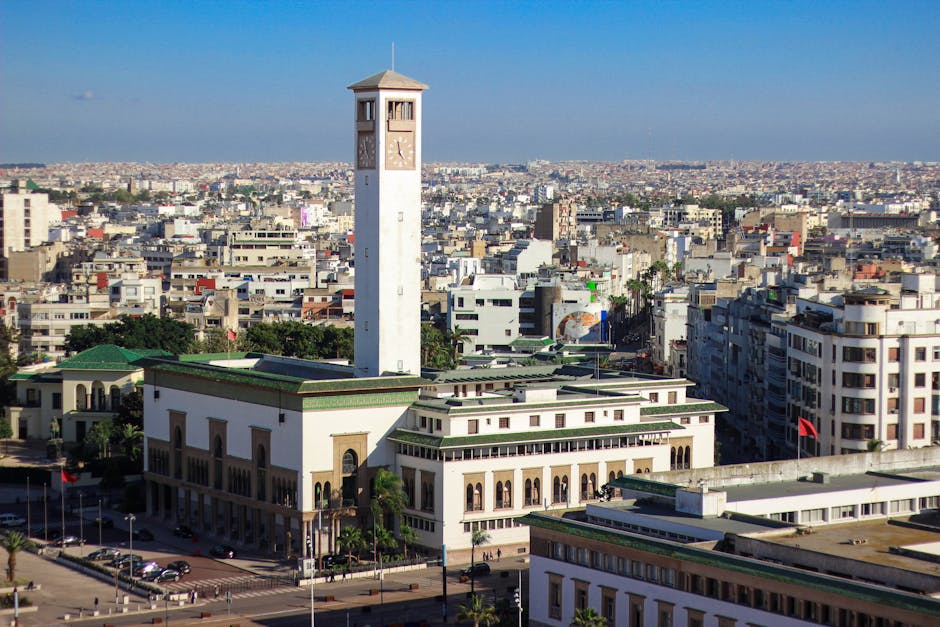 Stunning aerial view of Casablanca's cityscape, highlighting a tall clock tower.